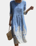 Isoline | Robe Florale Élégante